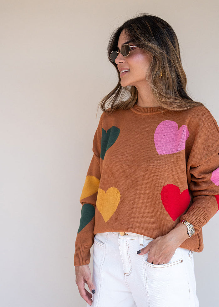 Brown acrylic knit sweater with multicolor heart pattern, round neck, and drop shoulders