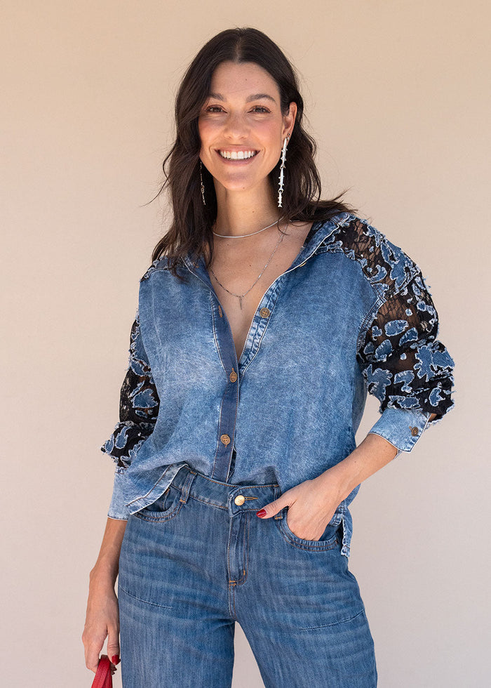 Blue washed Tencel shirt with band collar, buttoned cuffs, and lace sleeve panels