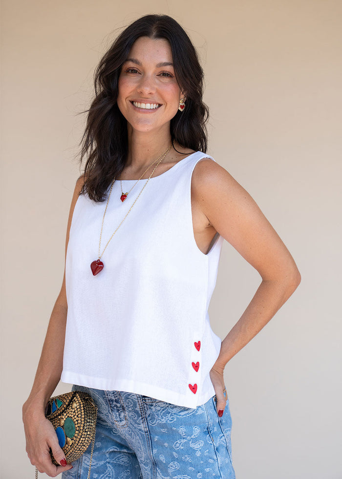 Ivory rayon-linen sleeveless blouse with round neckline and heart-shaped side buttons, view 2