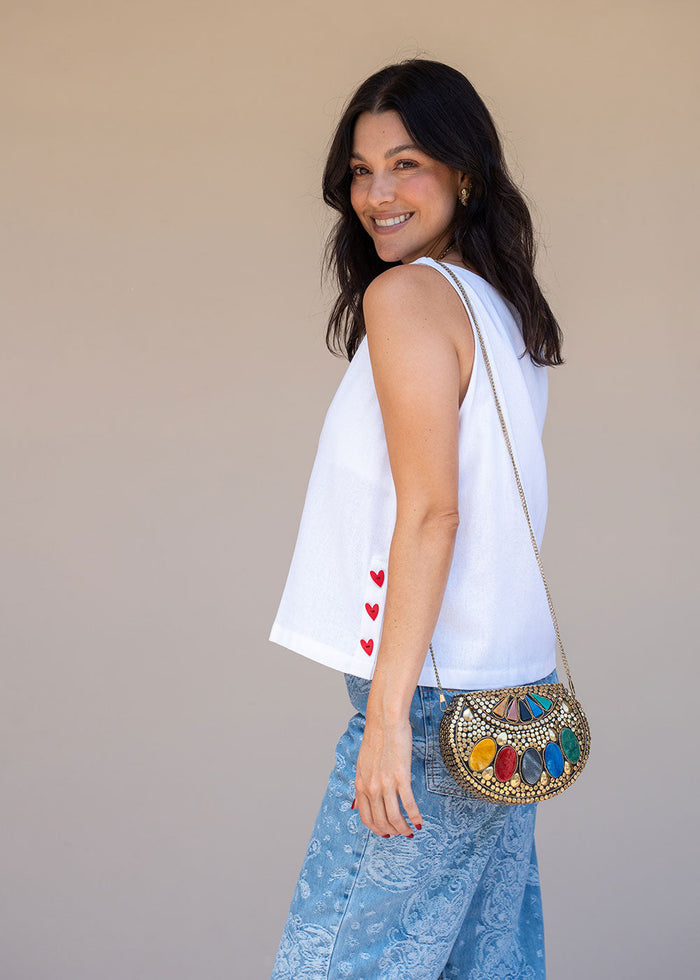 Ivory rayon-linen sleeveless blouse with round neckline and heart-shaped side buttons, view 5