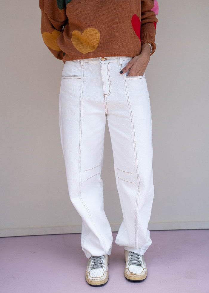 Ivory cotton drill jean with barrel leg, contrast topstitching, and patch back pockets
