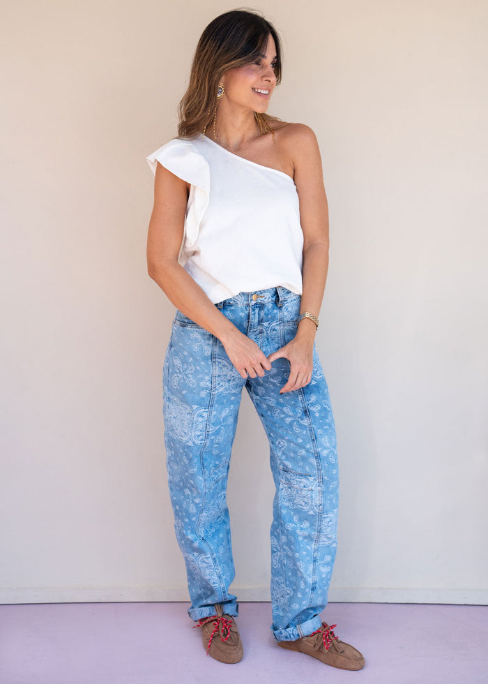 Indigo cotton drill jean with paisley print, barrel leg, and patch back pockets, view 4