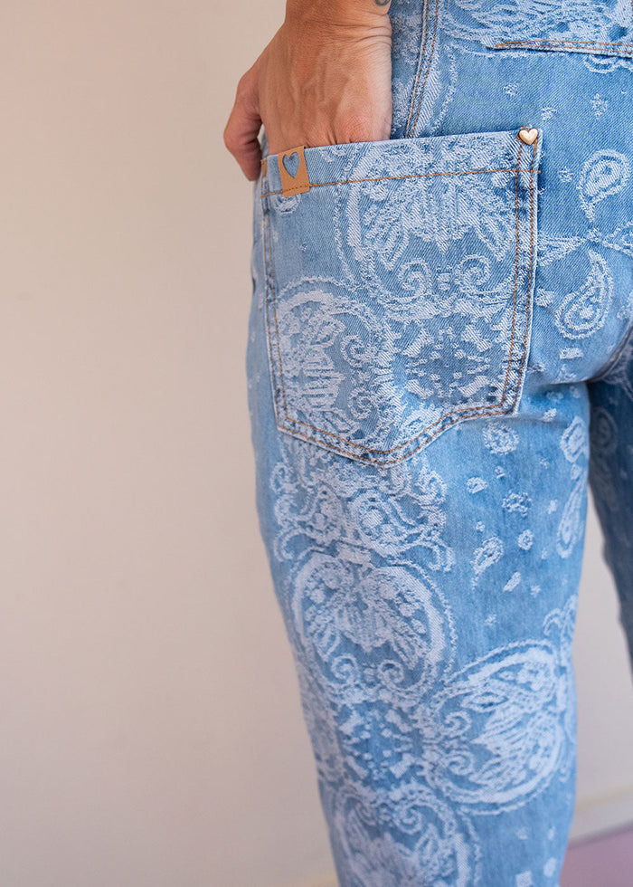 Indigo cotton drill jean with paisley print, barrel leg, and patch back pockets, view 5