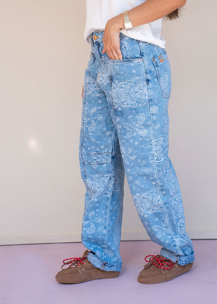Indigo cotton drill jean with paisley print, barrel leg, and patch back pockets, view 6