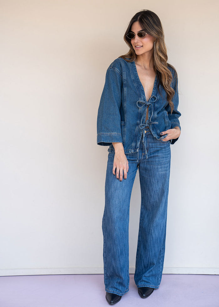 Indigo denim jacket with tie-front neckline, functional pockets, and 3/4 sleeves, view 3