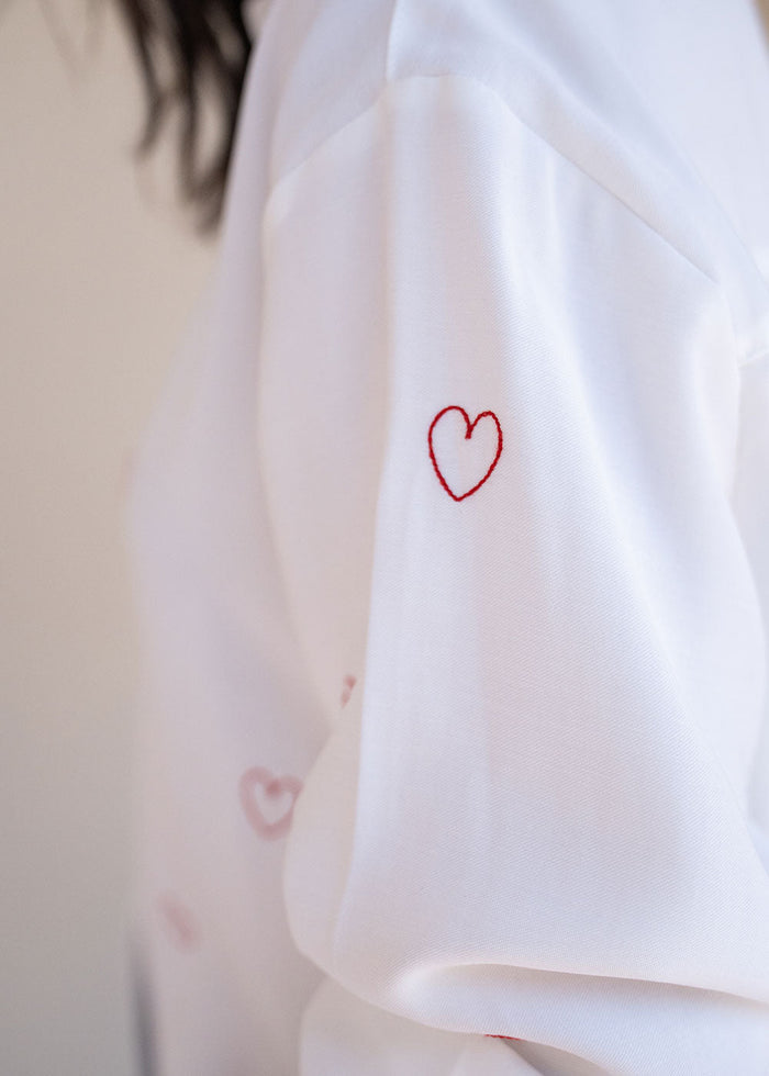 Ivory viscose challis shirt with red heart embroidery, band collar, and buttoned cuffs, view 4